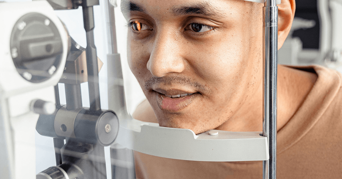 Optometrist performing a cataract evaluation with advanced eye imaging