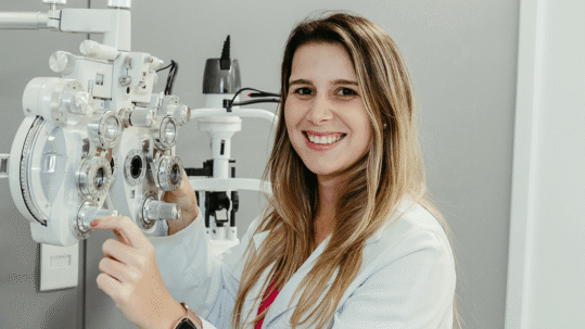Eye doctor reviewing retinal imaging during a cataract evaluation in Billings